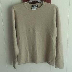 Cream and a light brown cashmere sweater.